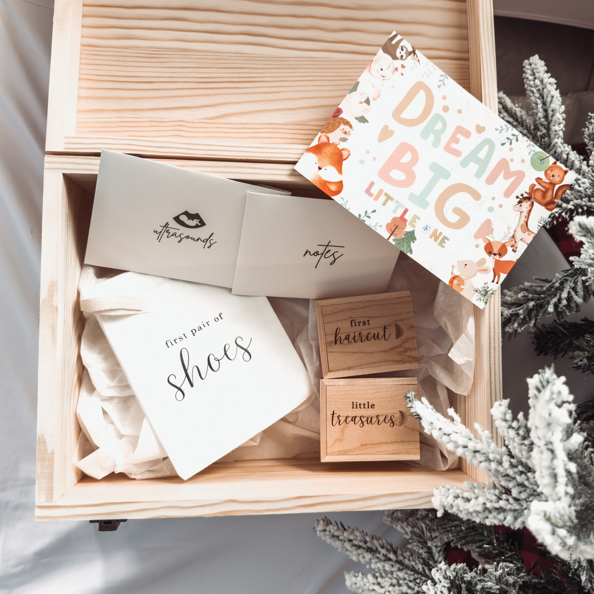 Baby keepsake box filled with memory add-ons