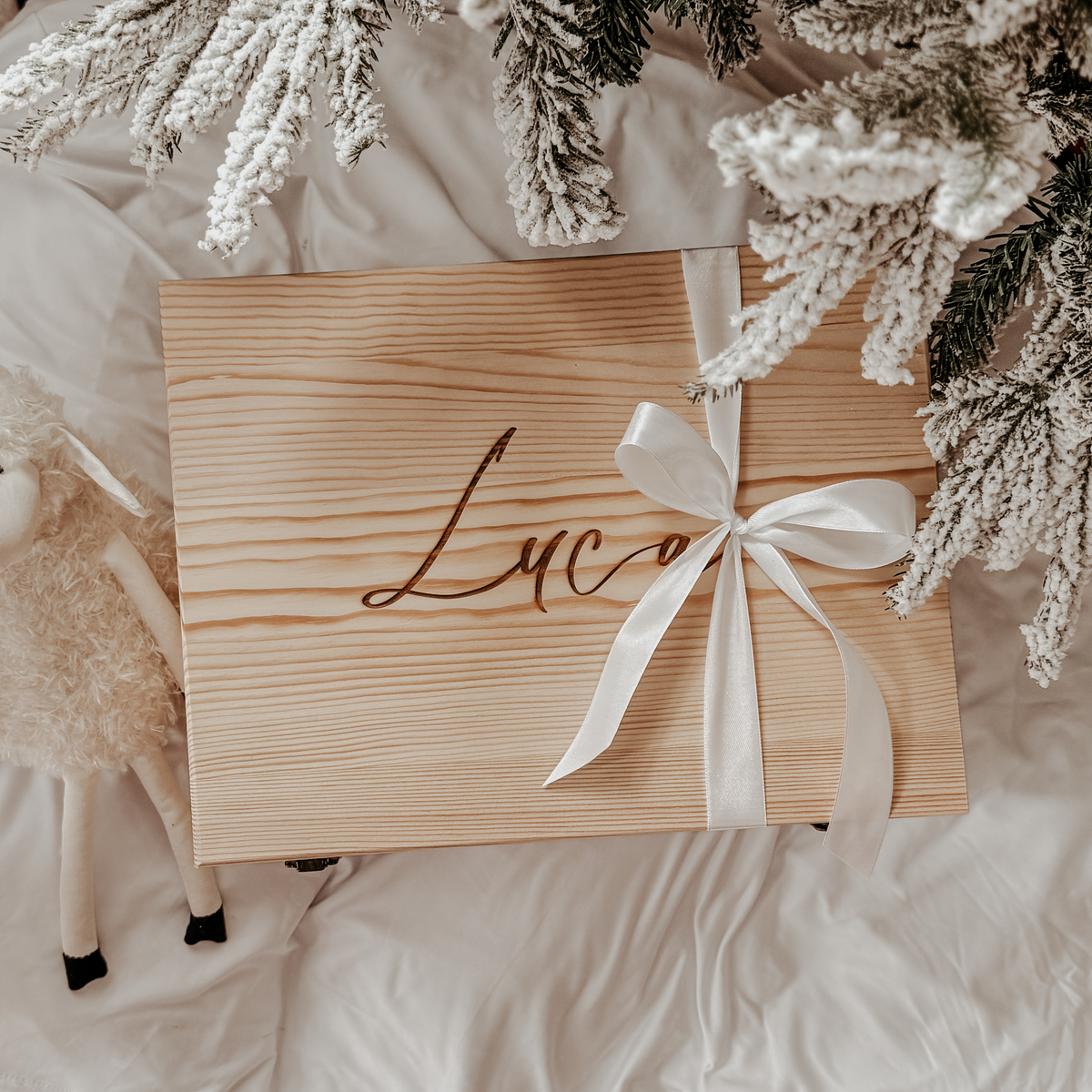 Personalized wooden baby keepsake box wrapped for gifting