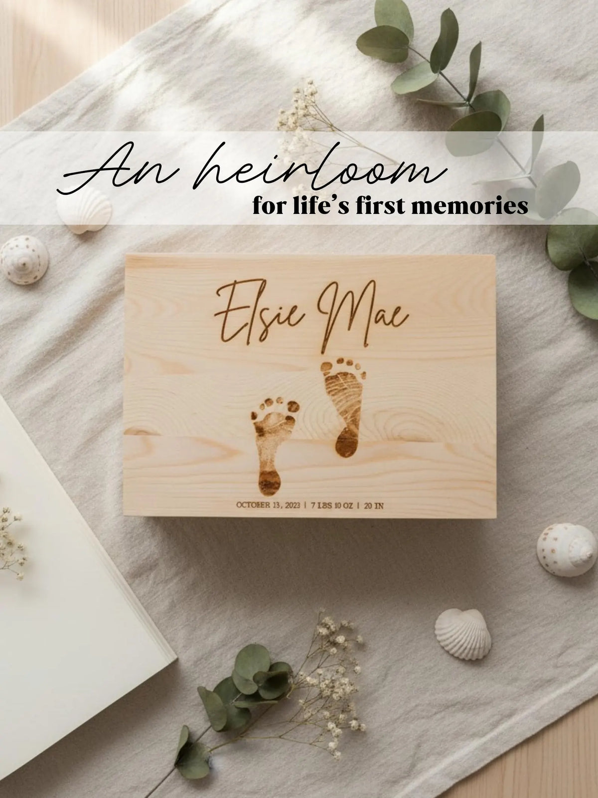 Personalized baby memory box with engraved footprints and custom name on natural wood